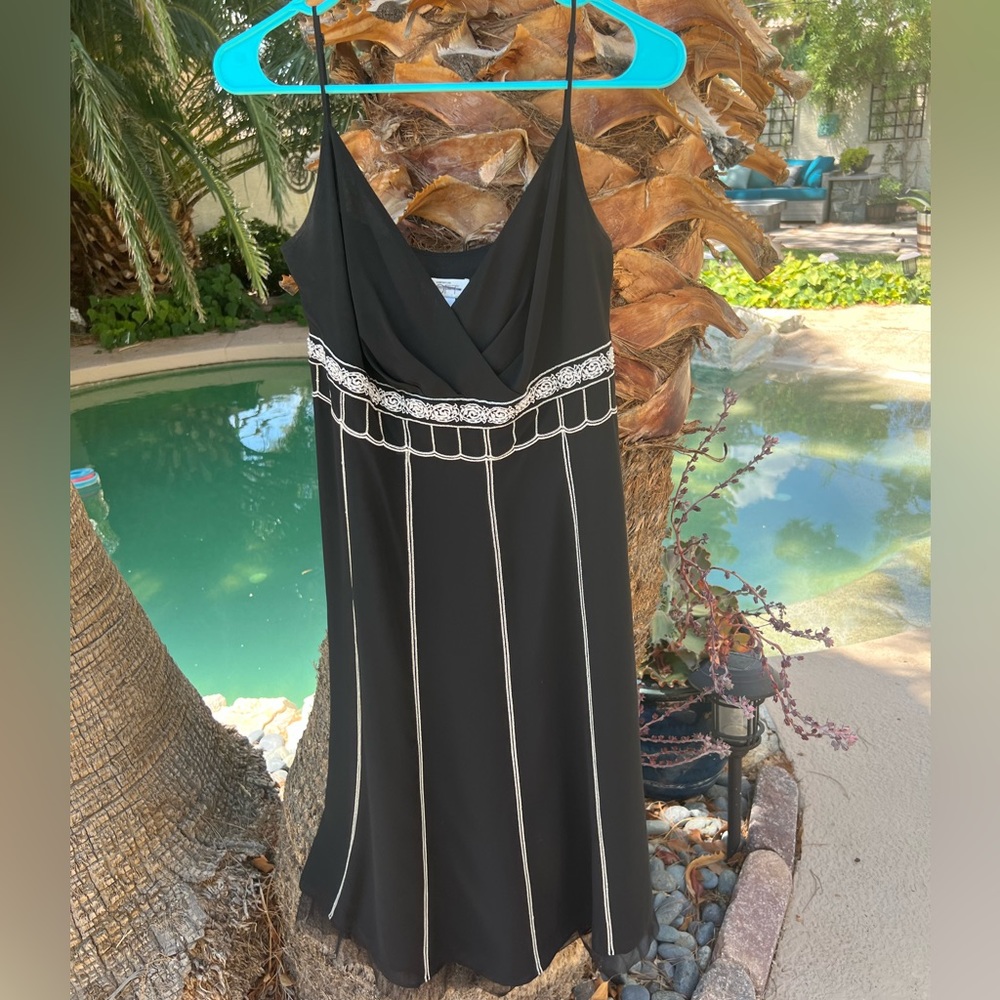Flattering fancy and comfy dress.